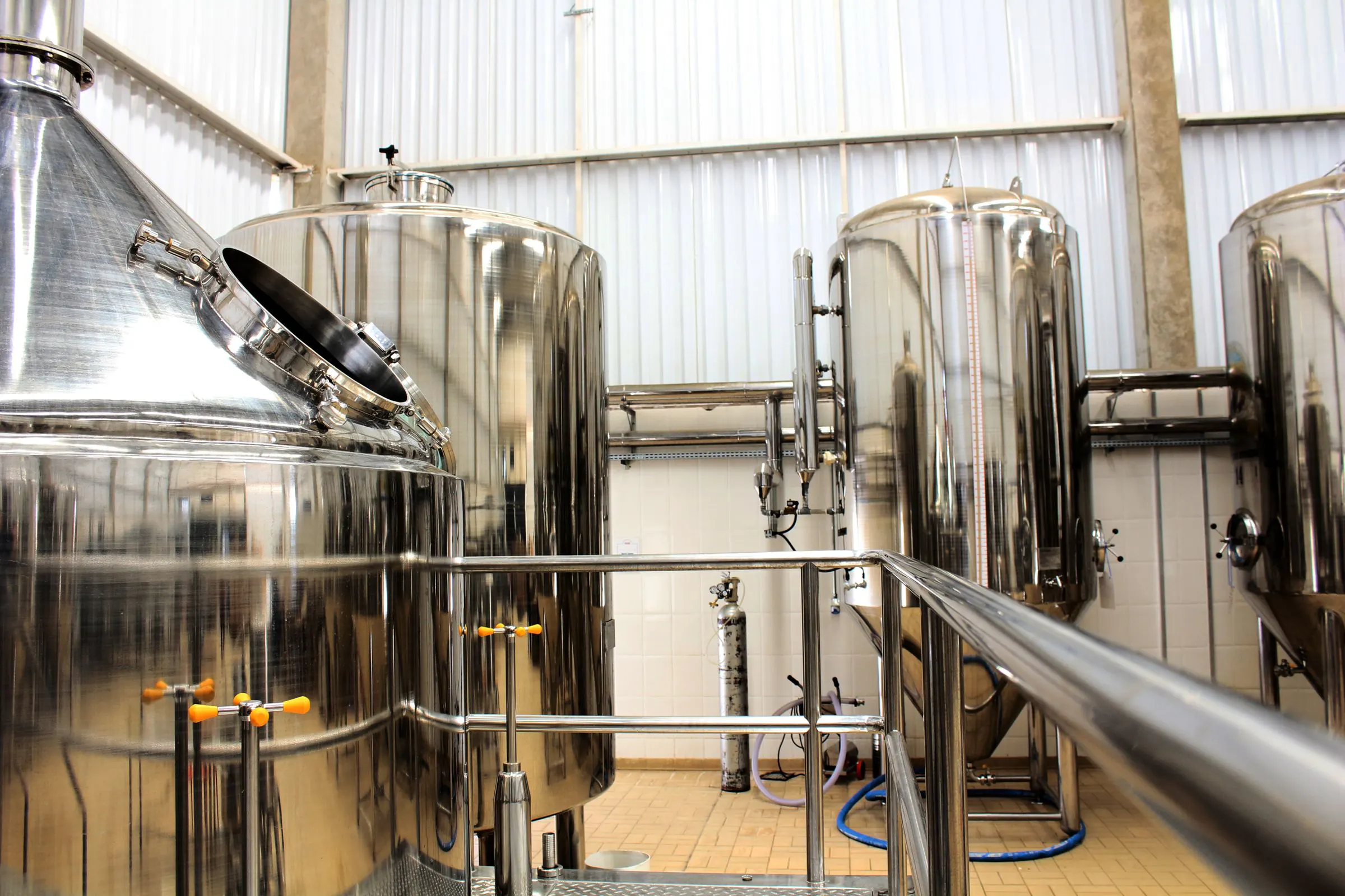 Large stainless-steel processing vessels in a controlled production environment